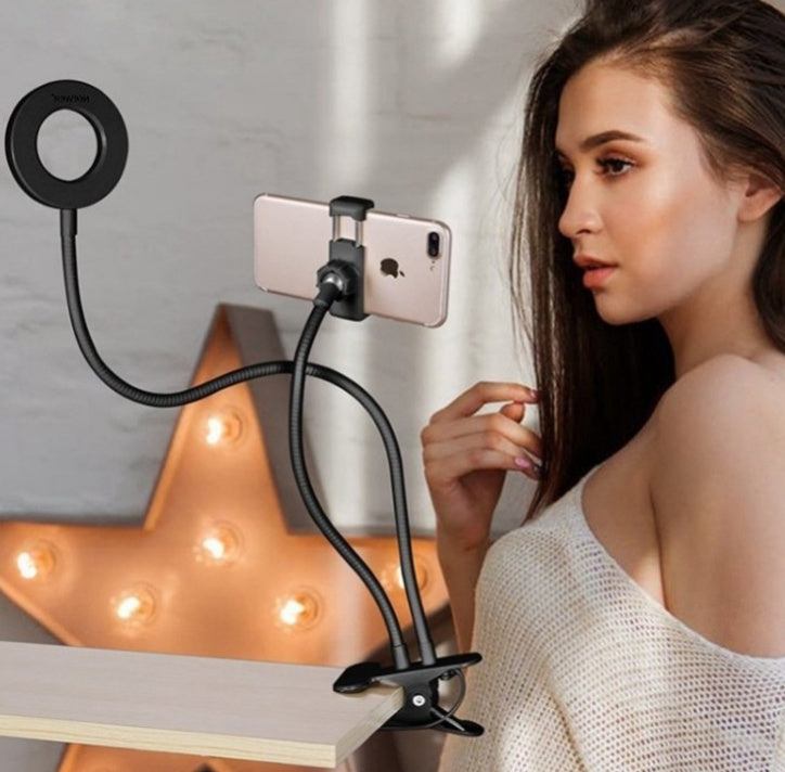 Professional LED ring light for makeup and vlogging with adjustable stand and universal phone holder