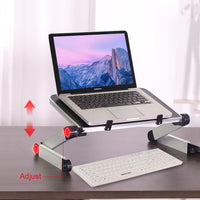 Ergonomic foldable laptop stand with adjustable desk and tablet holder in black and white