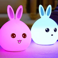 Touch sensor night light shaped like a cute rabbit with colorful LED lighting