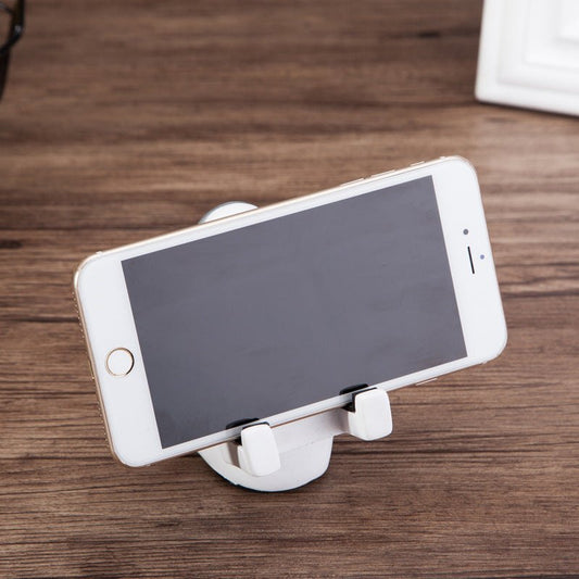 Lifestyle shot of Space Spaceman Mobile Phone Desk Holder in a modern home office setup